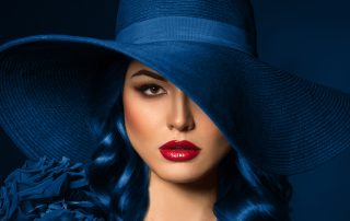Portrait of a woman with blue rose corsage