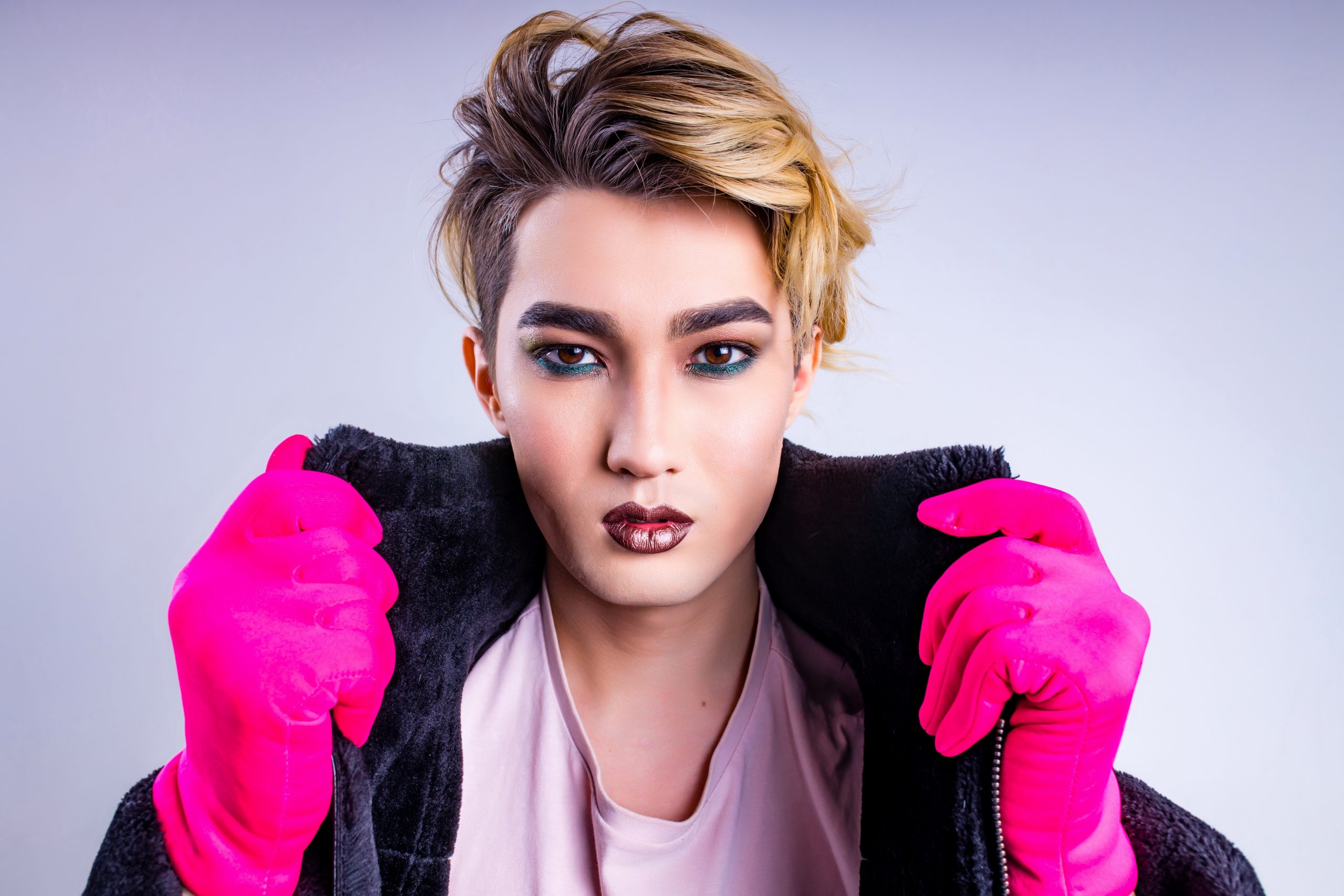 Portrait of stylish fashion non-binary confident and self-acceptance with gender identity