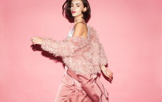young fashion woman in pink clothes run on pink background