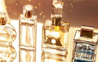 Aromatic Perfume bottles on background