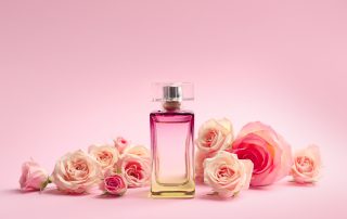 modern floral fragrance with flowers on color background